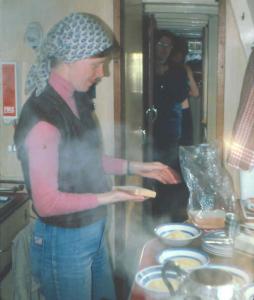 Hilary cooking aboard 81